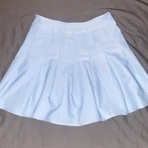 A short blue tennis skirt from Forever 21. Size 2. Fits very comfortably.